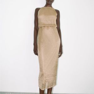 Zara metallic thread dress with tie in the back and low scoop neck back.